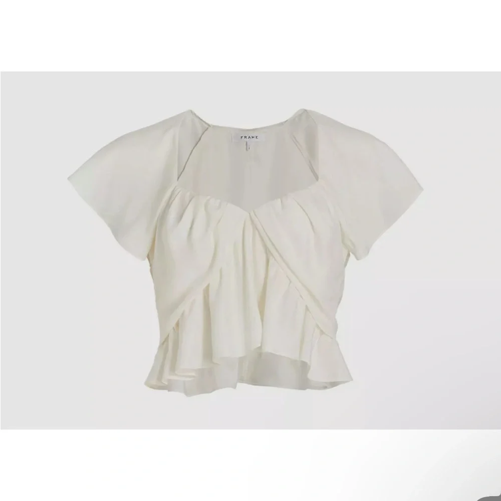 FRAME DENIM
SHIRRED FLOUNCE TOP - OFF WHITE
$369.00 size L - Picture 6 of 9